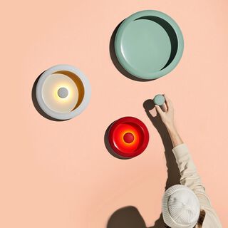3 different color Oloha's on a wall