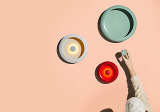 3 different color Oloha's on a wall