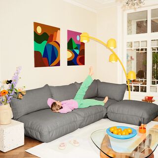 woman on sofa next to Big Lebow